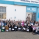 School and college staff gathered outside Boathouse 4 with their certificates after attending special event